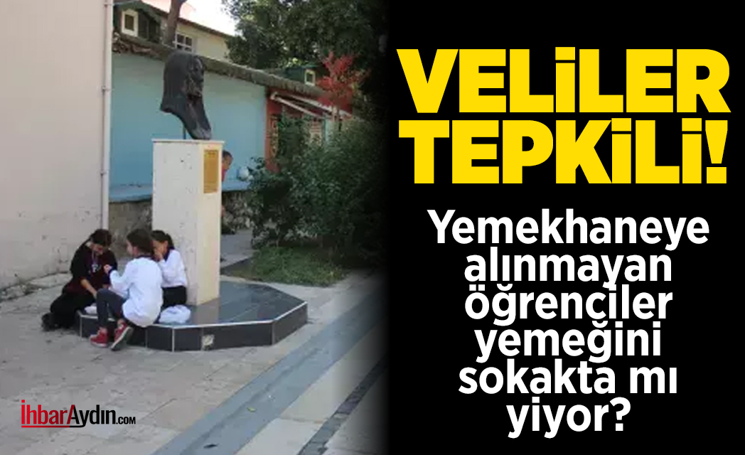 Efeler ilçesindeki bir okulun öğrencilerinin öğle arasında yemeklerini sokaktaki bank